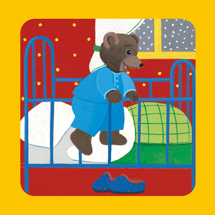 Petit ours brun découvre ses cadeaux de Noël