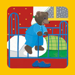 Petit ours brun découvre ses cadeaux de Noël