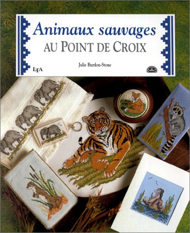 Animaux sauvages au point de croix