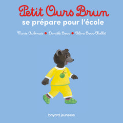 Petit ours brun se prépare pour l'école