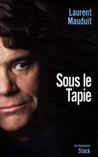 Sous le tapie