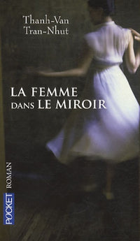 FEMME DANS LE MIROIR