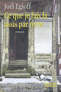 Ce que je fais là, assis par terre