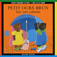 Petit ours brun fait une cabane