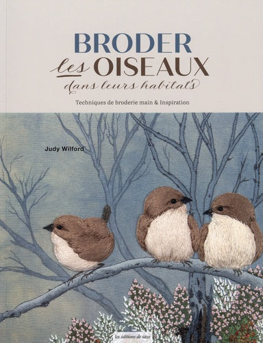 Les oiseaux brodés dans leurs habitats