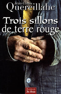 Trois sillons de terre rouge