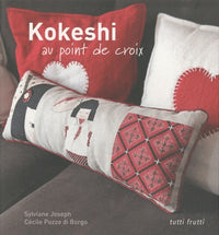 Kokeshi au point de croix
