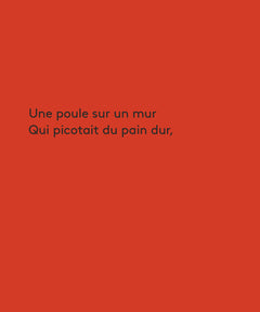 Une poule sur un mur