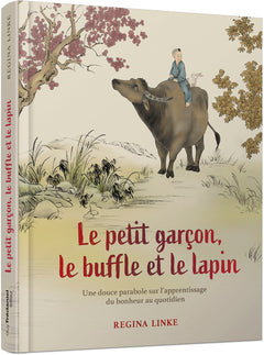 Le petit garçon, le buffle et le lapin
