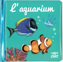 Bébé touche-à-tout - L'aquarium