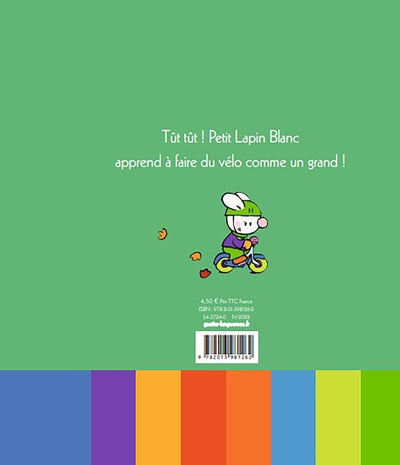 Petit Lapin Blanc fait du vélo
