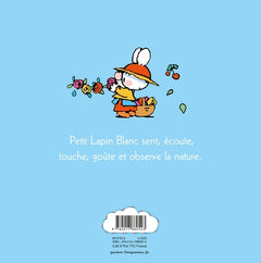 Petit lapin blanc découvre la nature