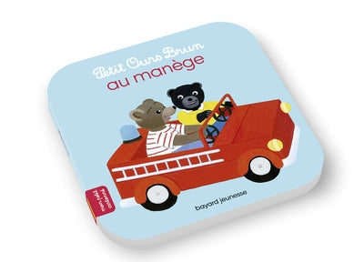 Petit ours brun va au manège