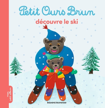 Petit ours brun découvre le ski