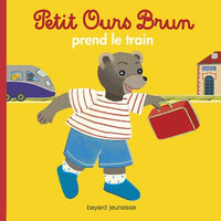 Petit ours brun prend le train