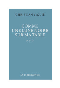 Comme une lune noire sur ma table