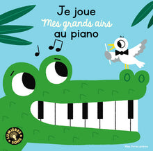 Je joue mes grands airs au piano